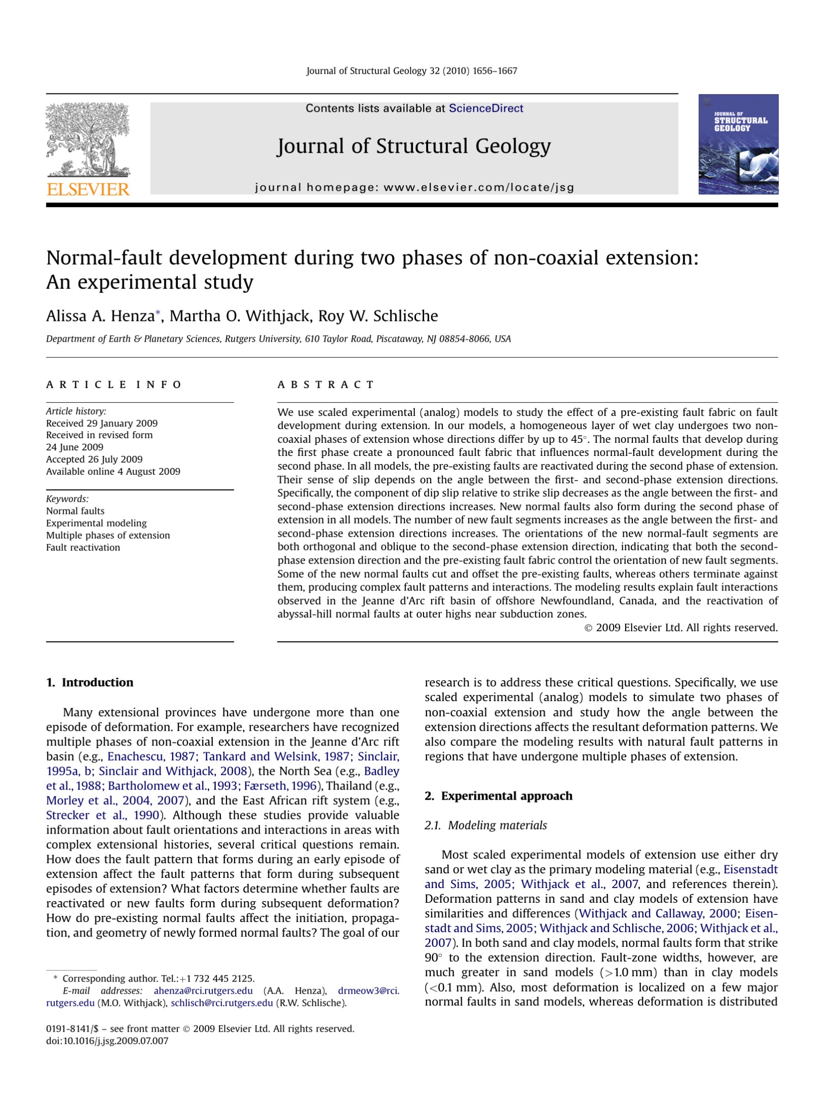 Normal-fault development during two phases of non-coaxial extension: An experimental study